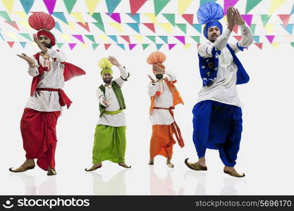 Sikh men dancing