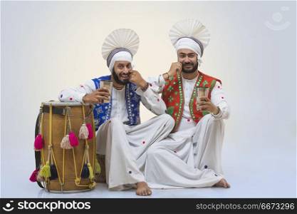 Sikh People drinking Lassi during Baisakhi celebrations