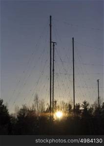 Silhouette Antenna against the sky at sunrise. Silhouette Antenna against the sky at sunrise.