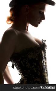 silhouette backlight picture of sexy woman in corset