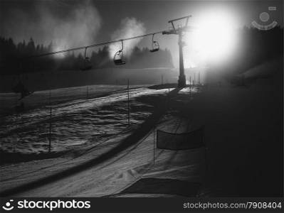 Silhouette black and white photo of ski slope at Austrian Alps at sunny day