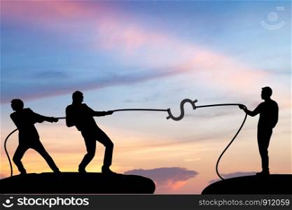 Silhouette businessmen pulling a rope , business concept, marketing concept