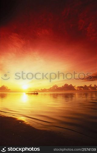 Silhouette of a boat in the sea, Bali, Indonesia