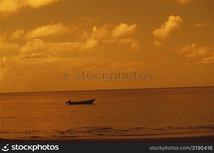 Silhouette of a boat in the sea, Caribbean