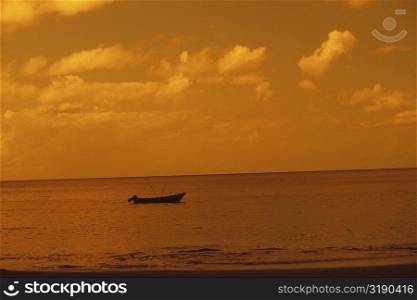 Silhouette of a boat in the sea, Caribbean