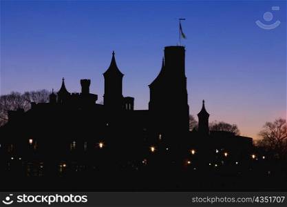 Silhouette of a castle at dusk, Washington DC, USA