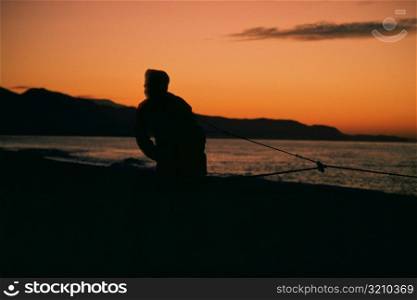 Silhouette of a fisherman, Malaga, Spain