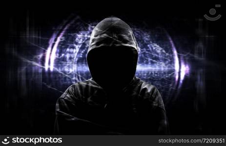 Silhouette of a hacker on black with binary codes