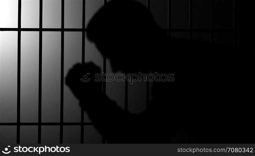 Silhouette of a man in prison (B/W Version)