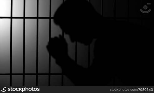 Silhouette of a man in prison (B/W Version)