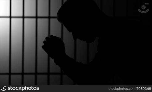 Silhouette of a man in prison (B/W Version)