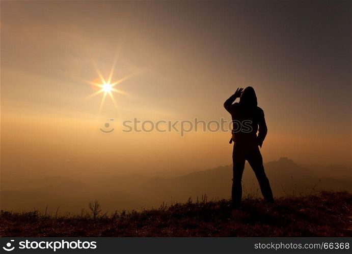silhouette of a man on the Mountain
