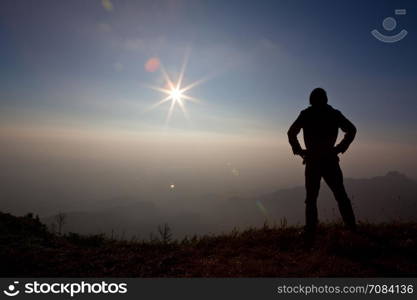 silhouette of a man on the Mountain