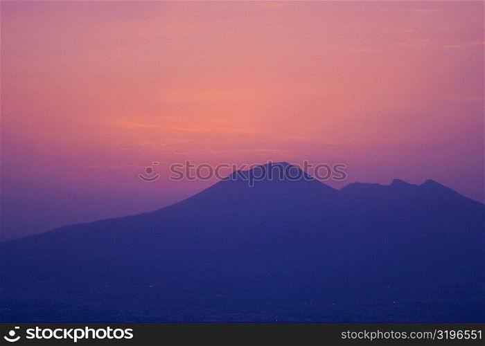Silhouette of a mountain at dusk, Mt Vesuvius, Bay of Naples, Naples, Naples Province, Campania, Italy