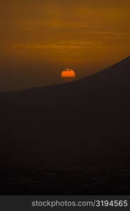 Silhouette of a mountain at sunset, Mt Vesuvius, Naples, Campania, Italy