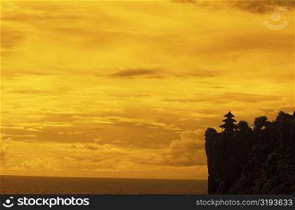 Silhouette of a pagoda on a cliff, Bali, Indonesia