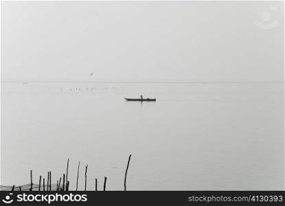 Silhouette of a person boating in a river, Cienaga, Atlantico, Colombia