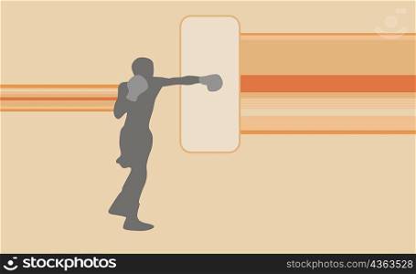 Silhouette of a person boxing