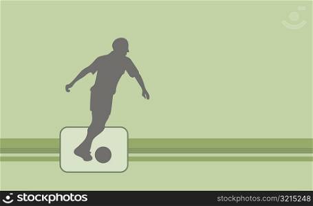 Silhouette of a person playing soccer