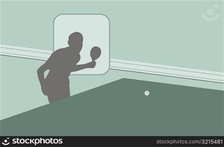 Silhouette of a person playing table tennis