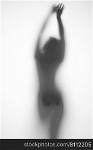silhouette of a pregnant woman from behind and arms outstretched on a light background. silhouette of a pregnant woman on a light background