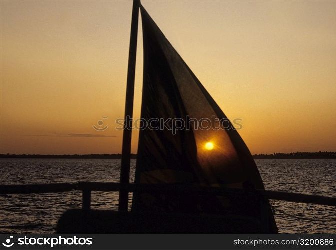 Silhouette of a sailboat in the sea at sunset, Pemba, Tanzania