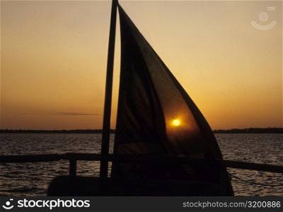 Silhouette of a sailboat in the sea at sunset, Pemba, Tanzania