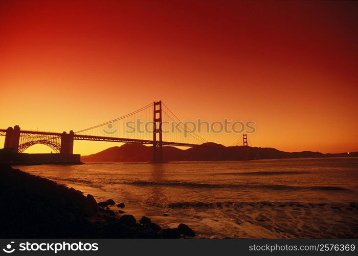 Silhouette of a suspension bridge, Golden Gate Bridge, San Francisco, California, USA