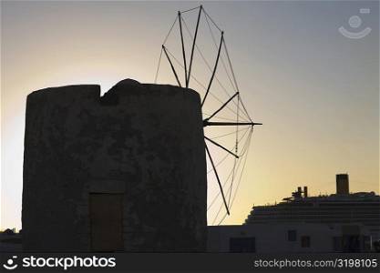 Silhouette of a traditional windmill, Mykonos, Cyclades Islands, Greece