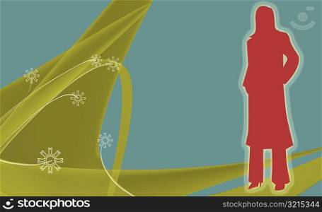 Silhouette of a woman standing in a field
