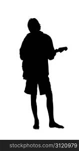 Silhouette of a young boy or girl playing a guitar, while at a beach party