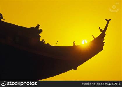 Silhouette of an eaves, China
