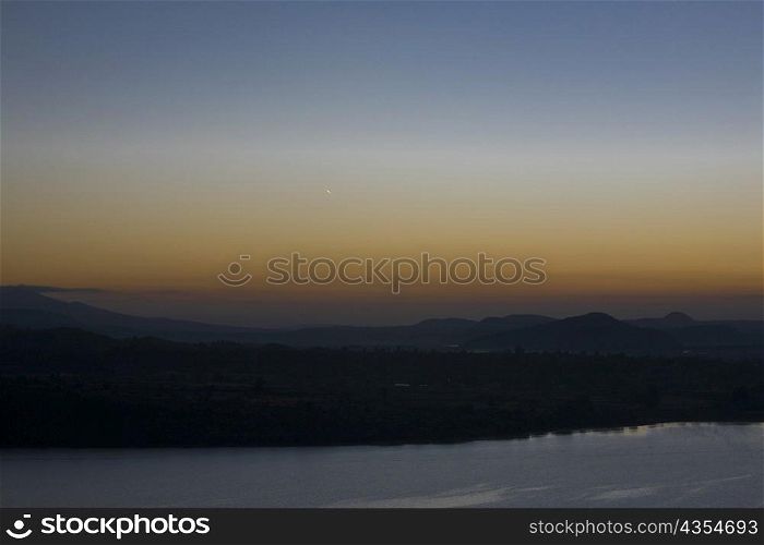 Silhouette of an island at dusk, Janitzio Island, Lake Patzcuaro, Morelia, Michoacan State, Mexico