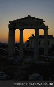 Silhouette of an old ruin at sunset, Roman Agora, Athens, Greece