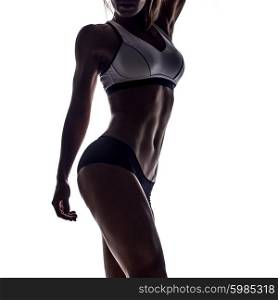silhouette of attractive fitness woman, trained female body, lifestyle portrait, caucasian model