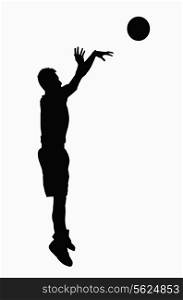 Silhouette of basketball player jumping.