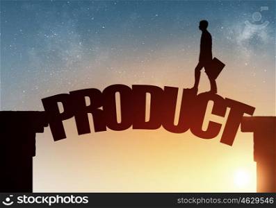 Silhouette of businessman over sunrise. Businessman running on product word bridge over precipice