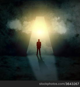 Silhouette of businessman standing in keyhole sun shining above