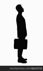 Silhouette of businessman with briefcase.