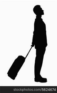 Silhouette of businessman with suitcase.