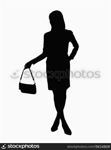 Silhouette of businesswoman holding handbag.