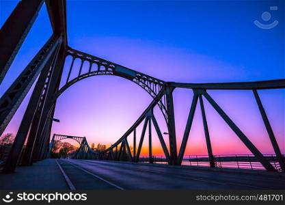 Silhouette of Glienicker Bridge in Berlin, evening scenery
