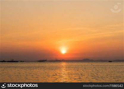 Silhouette of Harbor with sunset in Sriracha Chonburi, Thailand