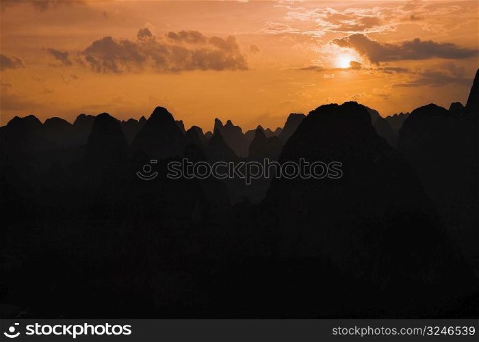 Silhouette of hill ranges at dusk, Guilin Hills, Xingping, Yangshuo, Guangxi Province, China