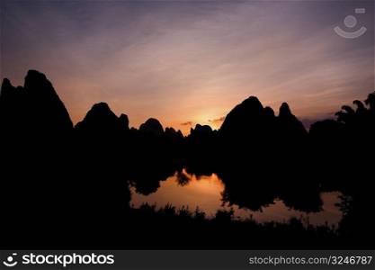 Silhouette of hill ranges at dusk, Guilin Hills, Xingping, Yangshuo, Guangxi Province, China