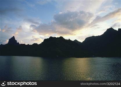 Silhouette of hills at the water front, Cooks Bay, Moorea, Society Islands, French Polynesia