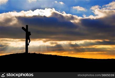Silhouette of Jesus Christ crucifixion on cross on Good Friday Easter