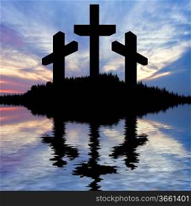 Silhouette of Jesus Christ crucifixion on cross on Good Friday Easter reflected in lake water