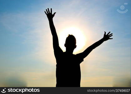 silhouette of man jumping for happy and victory