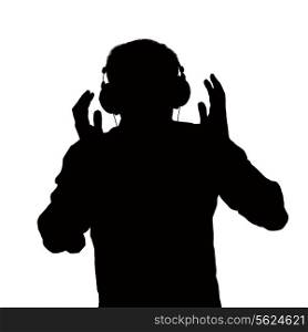 Silhouette of man listening to headphones.
